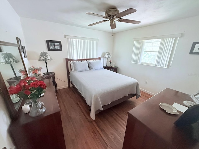 603 W Seminole Ave, Eustis, FL 32726 - bedroom featuring baseboards, wood finished floors, and ceiling fan