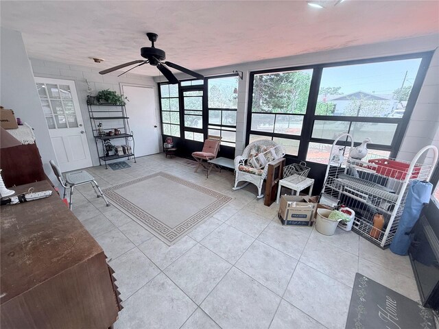 603 W Seminole Ave, Eustis, FL 32726 - tiled living room with a ceiling fan