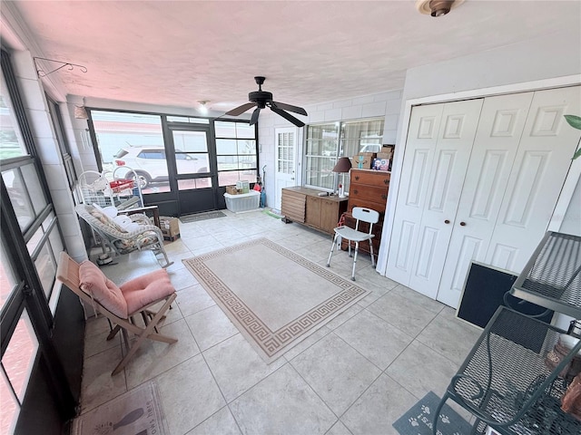 603 W Seminole Ave, Eustis, FL 32726 - tiled living room with a ceiling fan