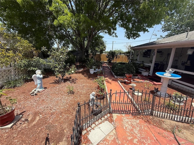 603 W Seminole Ave, Eustis, FL 32726 - fenced yard featuring a gate