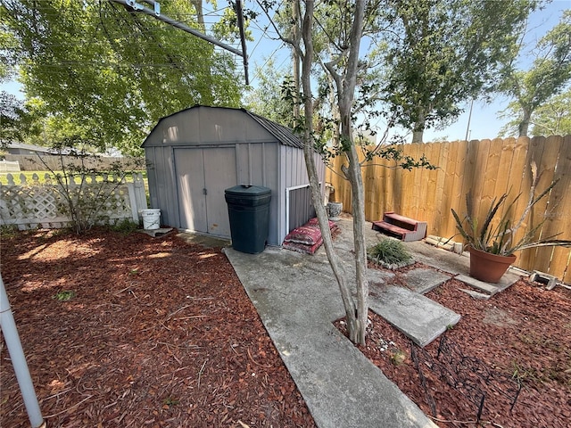 603 W Seminole Ave, Eustis, FL 32726 - fenced backyard featuring a storage shed and an outdoor structure