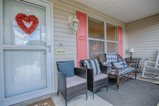 17009 SE 96th Chapelwood Cir, The Villages, FL 32162 - doorway to property featuring a porch