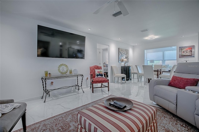 17009 SE 96th Chapelwood Cir, The Villages, FL 32162 - living area with marble finish floors, baseboards, a ceiling fan, and recessed lighting