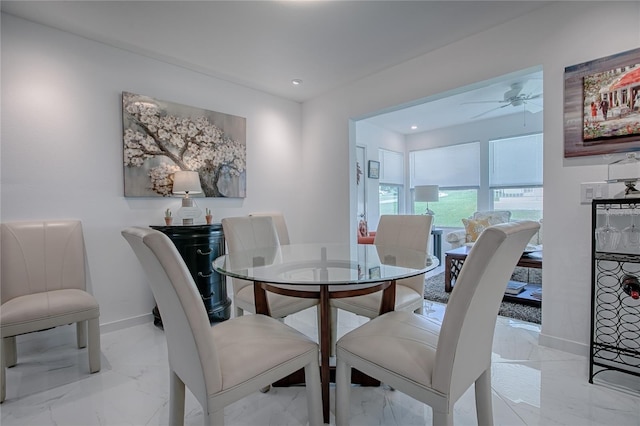 17009 SE 96th Chapelwood Cir, The Villages, FL 32162 - dining space featuring a ceiling fan, light marble finish floors, baseboards, and recessed lighting