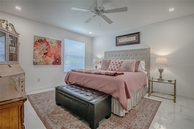 17009 SE 96th Chapelwood Cir, The Villages, FL 32162 - bedroom featuring baseboards, light marble finish floors, recessed lighting, and a ceiling fan