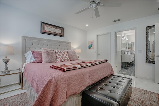 17009 SE 96th Chapelwood Cir, The Villages, FL 32162 - bedroom with marble finish floors, a ceiling fan, ensuite bath, baseboards, and recessed lighting