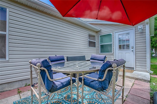 17009 SE 96th Chapelwood Cir, The Villages, FL 32162 - view of patio with outdoor dining area