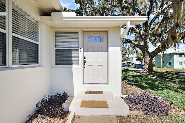 30 E Key Ave, Eustis, FL 32726 - entrance to property with stucco siding