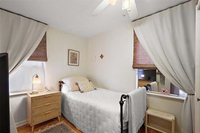 30 E Key Ave, Eustis, FL 32726 - bedroom with wood finished floors and a ceiling fan