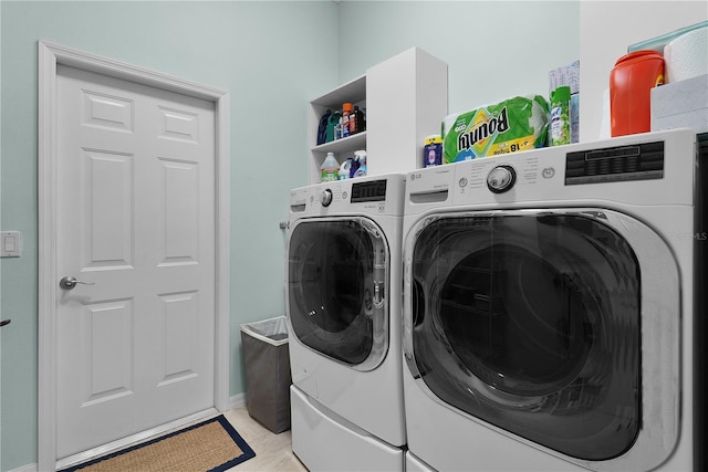 541 Carrera Dr, The Villages, FL 32159 - washroom with washer and clothes dryer and baseboards