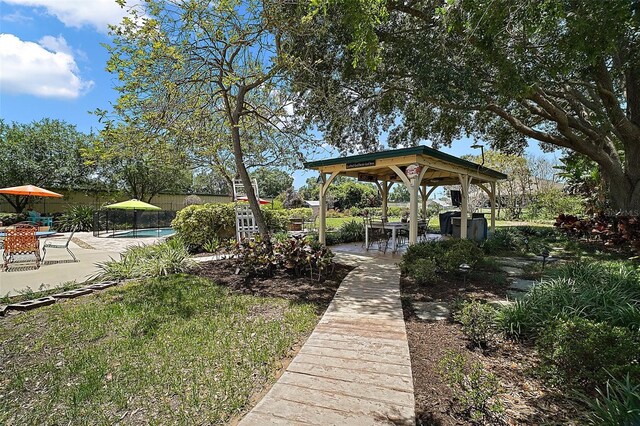397 Anderson Dr, Tavares, FL 32778 - view of yard with a gazebo, an outdoor pool, and a patio