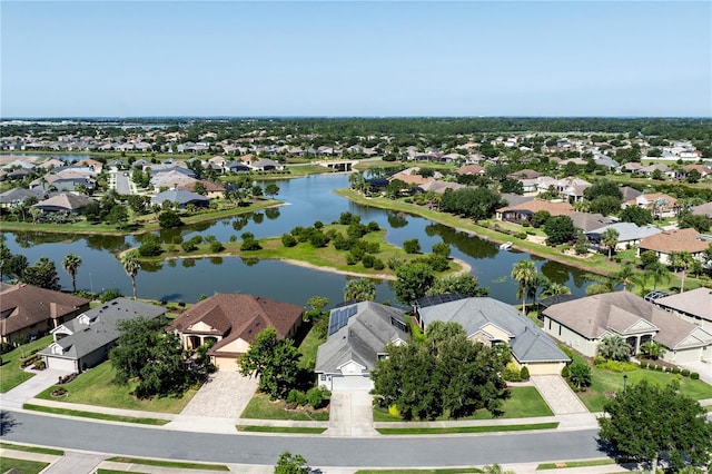 7873 Crosswinds Way, Mount Dora, FL 32757 - aerial perspective of suburban area with a large body of water