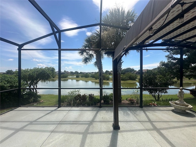 7873 Crosswinds Way, Mount Dora, FL 32757 - unfurnished sunroom with a water view