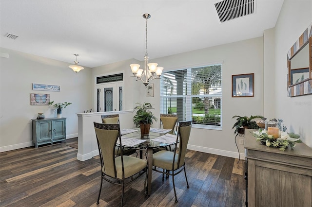 4581 Shenandoah River Trl, Leesburg, FL 34748 - dining space with dark wood-style floors, baseboards, and a chandelier