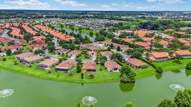aerial perspective of suburban area featuring a large body of water