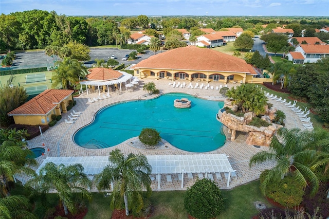 community pool featuring a patio area