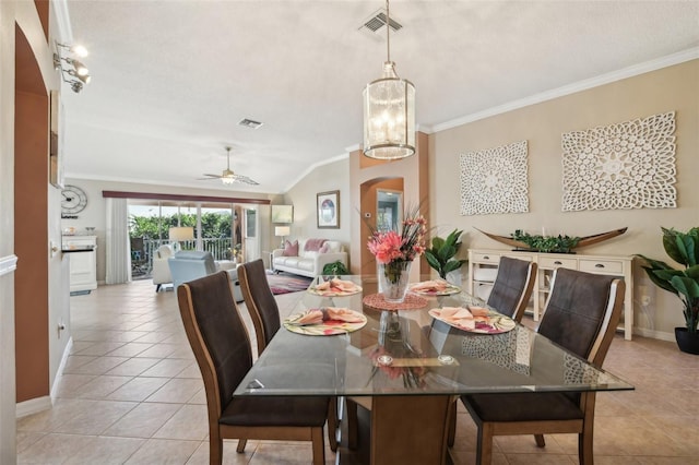 17108 SE 76th Creekside Cir, The Villages, FL 32162 - dining space with crown molding, light tile patterned flooring, baseboards, a ceiling fan, and a chandelier