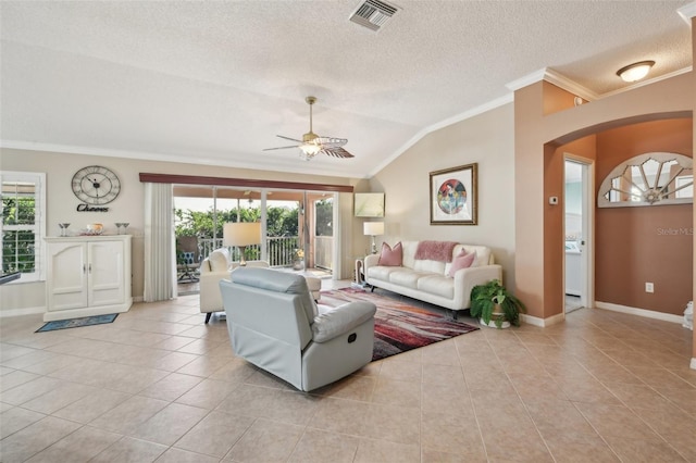 17108 SE 76th Creekside Cir, The Villages, FL 32162 - living room with crown molding, lofted ceiling, light tile patterned floors, ceiling fan, and arched walkways