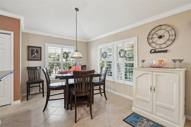 17108 SE 76th Creekside Cir, The Villages, FL 32162 - dining area featuring a textured ceiling, crown molding, baseboards, and light tile patterned flooring