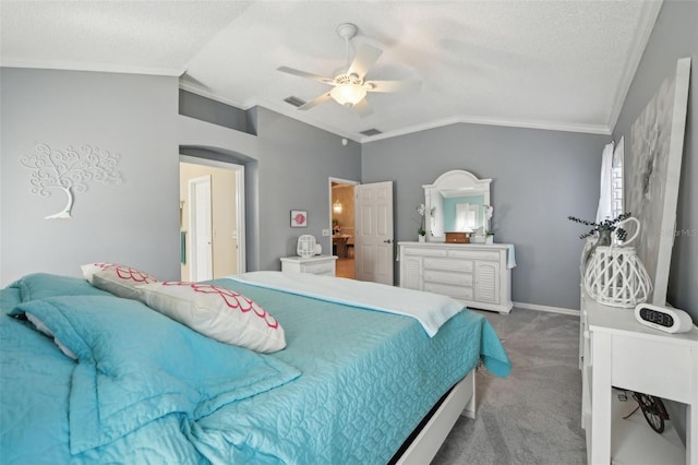 17108 SE 76th Creekside Cir, The Villages, FL 32162 - bedroom with ornamental molding, vaulted ceiling, carpet, a textured ceiling, and a ceiling fan