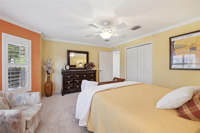 17108 SE 76th Creekside Cir, The Villages, FL 32162 - bedroom with carpet, crown molding, a ceiling fan, and a closet