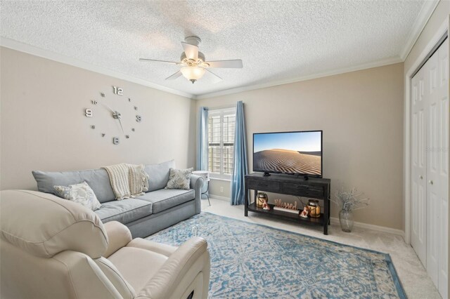 17108 SE 76th Creekside Cir, The Villages, FL 32162 - living area featuring light colored carpet, a ceiling fan, a textured ceiling, ornamental molding, and baseboards