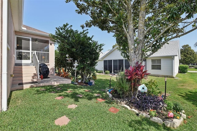 17108 SE 76th Creekside Cir, The Villages, FL 32162 - view of green lawn featuring a sunroom
