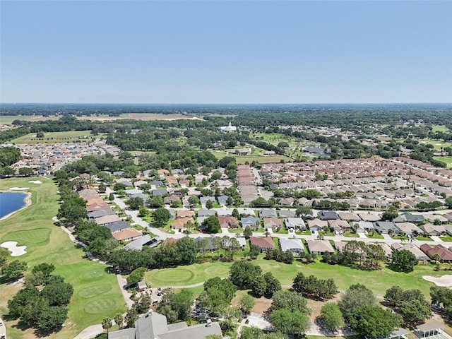 17108 SE 76th Creekside Cir, The Villages, FL 32162 - aerial view of property's location with a golf course, nearby suburban area, and a nearby body of water