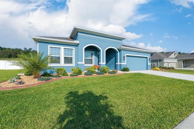 view of front of house with a garage, concrete driveway, and stucco siding