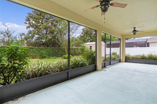 2424 Plumadore Dr, Grand Island, FL 32735 - unfurnished sunroom featuring ceiling fan