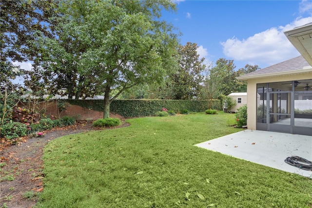 2424 Plumadore Dr, Grand Island, FL 32735 - view of yard with a sunroom, a patio, and ceiling fan