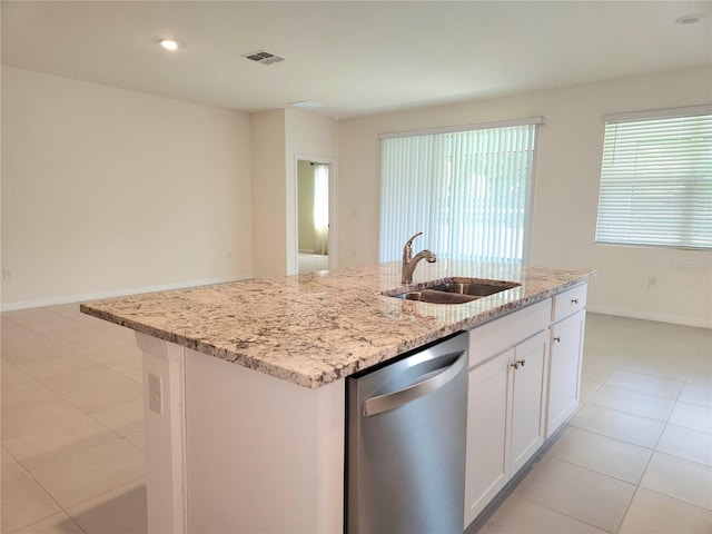 6203 SW 93rd Loop, Ocala, FL 34476 - kitchen with stainless steel dishwasher, a sink, light stone countertops, white cabinetry, and recessed lighting