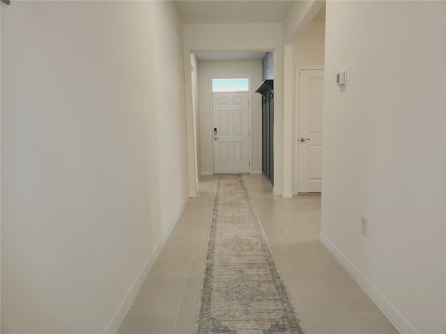 6203 SW 93rd Loop, Ocala, FL 34476 - corridor featuring light tile patterned floors and baseboards