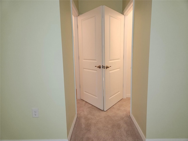 6203 SW 93rd Loop, Ocala, FL 34476 - hallway with light colored carpet and baseboards