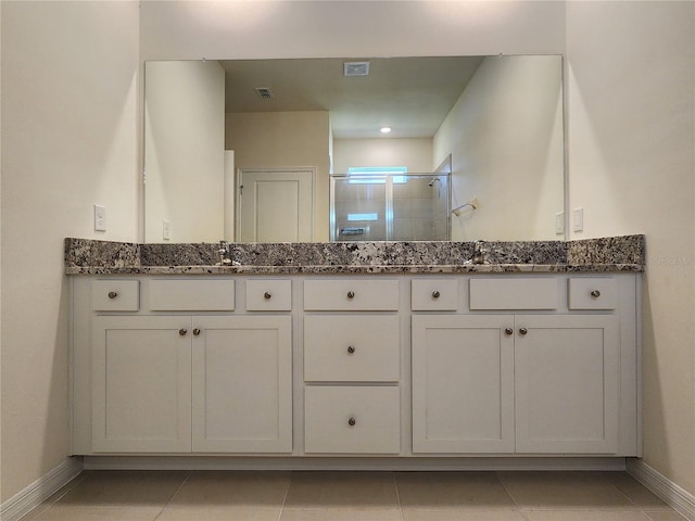 6203 SW 93rd Loop, Ocala, FL 34476 - full bath featuring baseboards, a shower stall, double vanity, and tile patterned flooring
