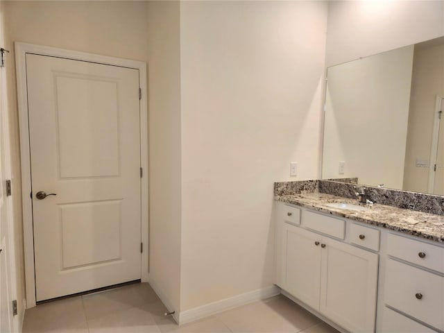 6203 SW 93rd Loop, Ocala, FL 34476 - bathroom featuring baseboards, vanity, and tile patterned floors