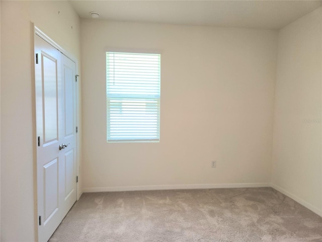 6203 SW 93rd Loop, Ocala, FL 34476 - unfurnished bedroom featuring light colored carpet and baseboards