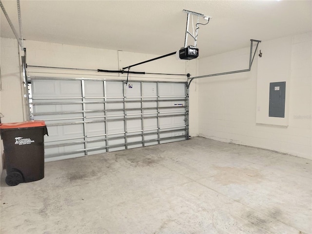 6203 SW 93rd Loop, Ocala, FL 34476 - garage featuring electric panel, a garage door opener, and concrete block wall