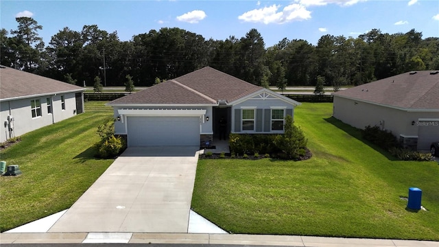 6203 SW 93rd Loop, Ocala, FL 34476 - view of front of property featuring an attached garage, driveway, a front lawn, and roof with shingles