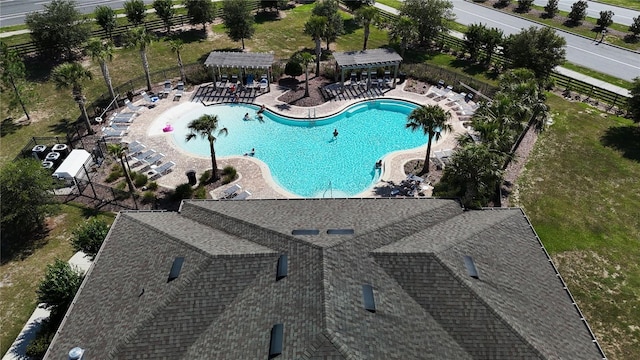 6203 SW 93rd Loop, Ocala, FL 34476 - community pool featuring a patio