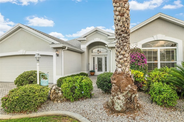 1521 Southport St, The Villages, FL 32162 - view of front facade with stucco siding, a garage, and driveway