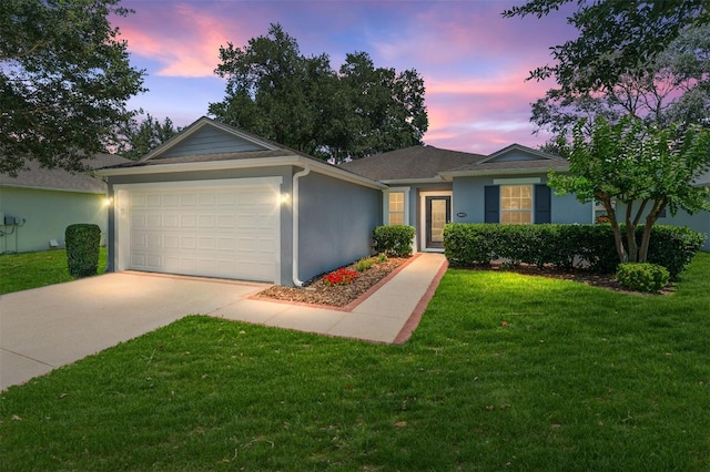 26822 Bull Run, Leesburg, FL 34748 - ranch-style house with a garage, concrete driveway, stucco siding, and a yard