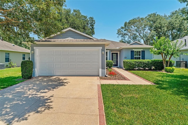 26822 Bull Run, Leesburg, FL 34748 - ranch-style house with central air condition unit, concrete driveway, stucco siding, and a front lawn