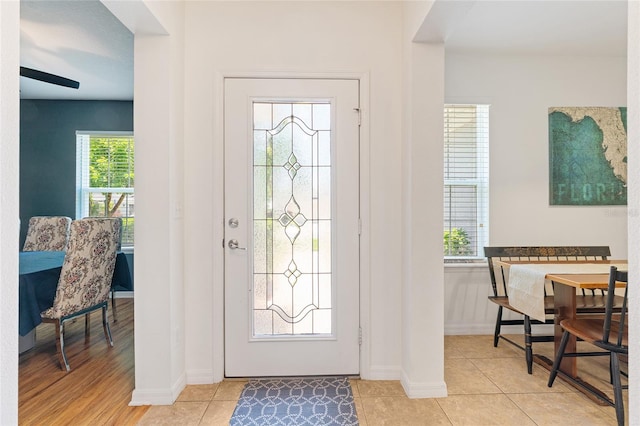 26822 Bull Run, Leesburg, FL 34748 - foyer entrance featuring light tile patterned floors and baseboards
