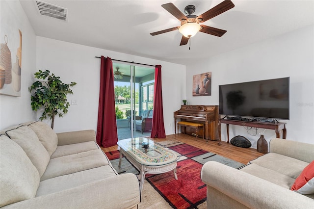 26822 Bull Run, Leesburg, FL 34748 - living room featuring ceiling fan and wood finished floors