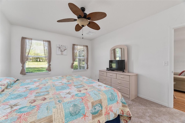 26822 Bull Run, Leesburg, FL 34748 - bedroom featuring light colored carpet, baseboards, and ceiling fan
