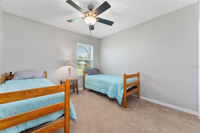 26822 Bull Run, Leesburg, FL 34748 - carpeted bedroom featuring baseboards and ceiling fan