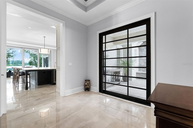 10122 Royal Island Ct, Orlando, FL 32836 - doorway to outside featuring light marble finish flooring, crown molding, and baseboards