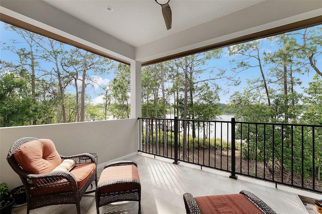 10122 Royal Island Ct, Orlando, FL 32836 - balcony with ceiling fan and a water view