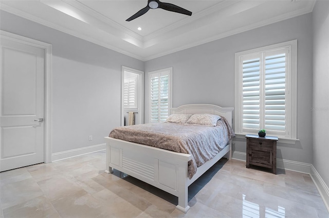 10122 Royal Island Ct, Orlando, FL 32836 - bedroom with multiple windows, ornamental molding, ceiling fan, a tray ceiling, and baseboards